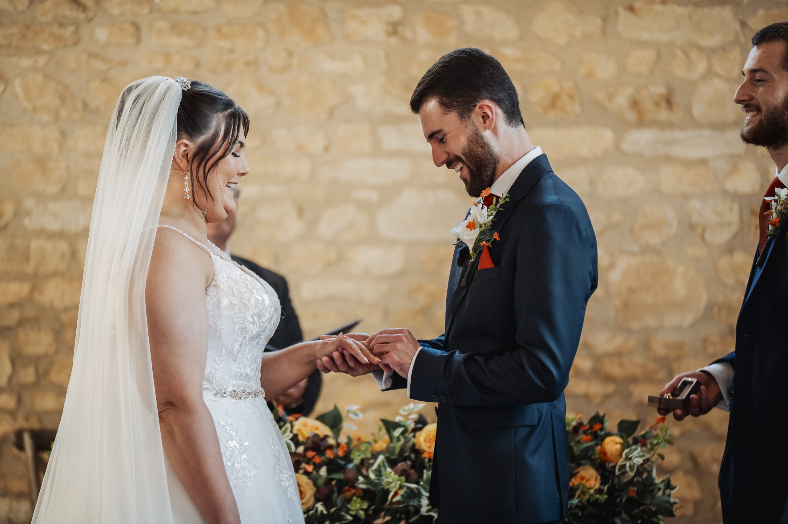 Bride & groom exchanging rings