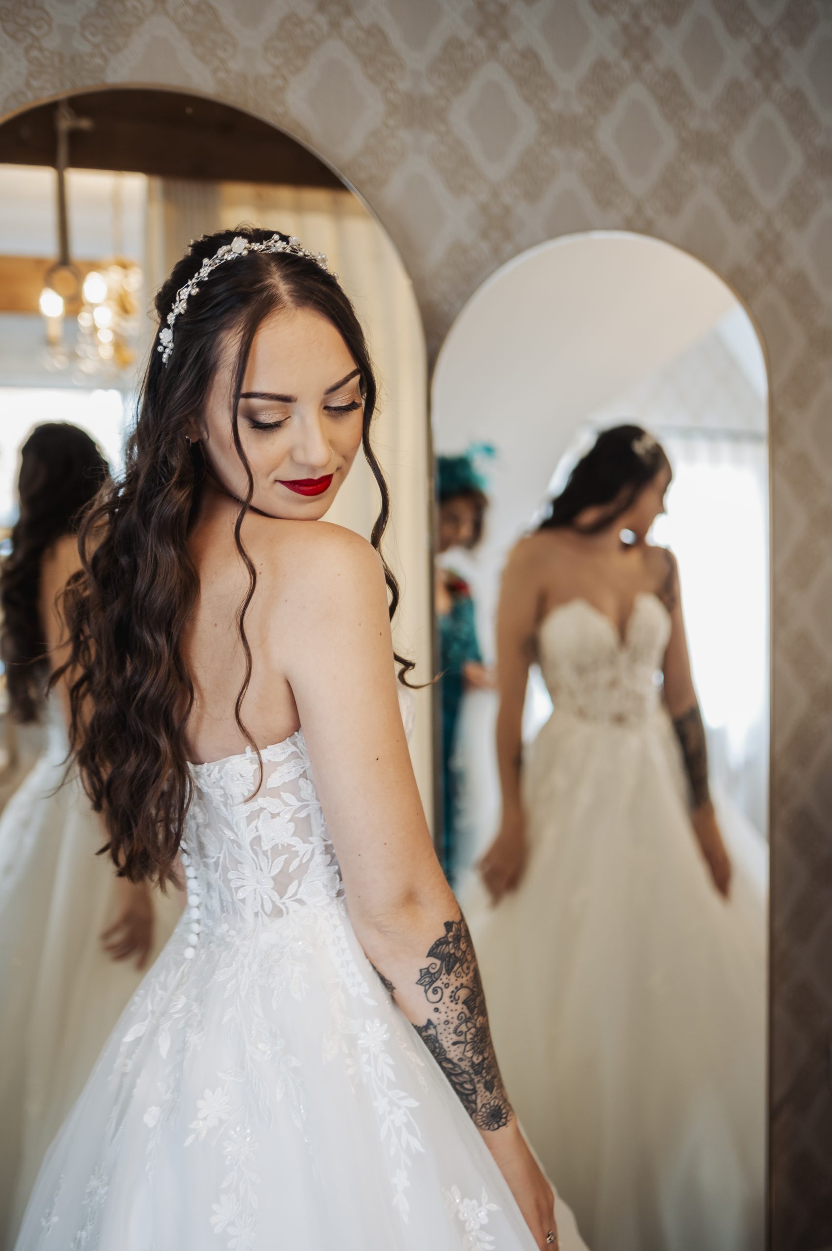 Bride standing in front of a mirror